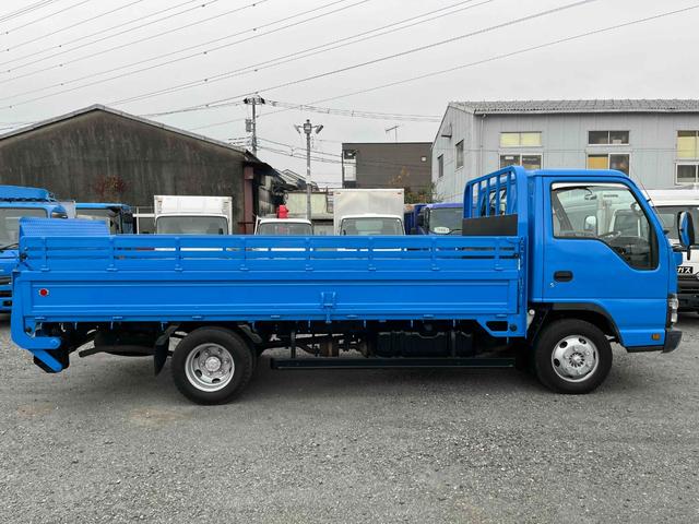 エルフトラック パワーゲート付ワイドロング3t積み平ボディー スムーサーAT ワイドロング3t積み平床ボディー スムーサーAT 車検R8年9月25日 荷台内寸長435幅200高68cm 荷台床面鉄板敷き 左右アオリ上下分割式 楽々ゲート付 新明和製アーム式PG付 タイヤ山7分(3枚目)