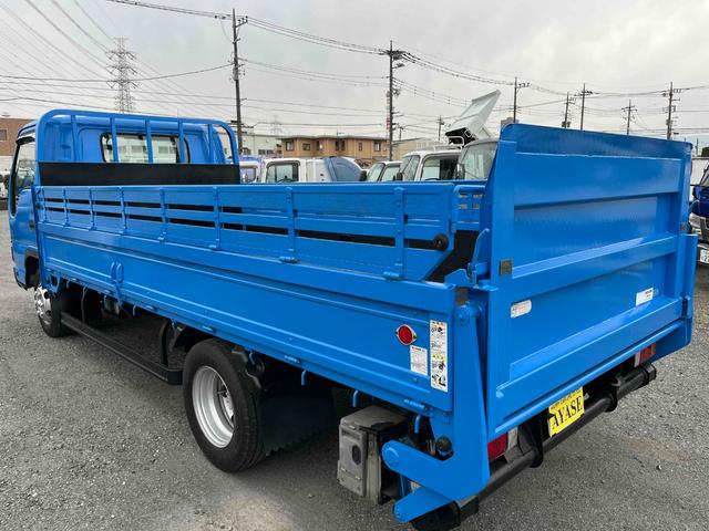 エルフトラック パワーゲート付ワイドロング3t積み平ボディー スムーサーAT ワイドロング3t積み平床ボディー スムーサーAT 車検R8年9月25日 荷台内寸長435幅200高68cm 荷台床面鉄板敷き 左右アオリ上下分割式 楽々ゲート付 新明和製アーム式PG付 タイヤ山7分(4枚目)