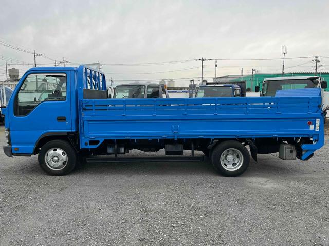 エルフトラック パワーゲート付ワイドロング3t積み平ボディー スムーサーAT ワイドロング3t積み平床ボディー スムーサーAT 車検R8年9月25日 荷台内寸長435幅200高68cm 荷台床面鉄板敷き 左右アオリ上下分割式 楽々ゲート付 新明和製アーム式PG付 タイヤ山7分(22枚目)