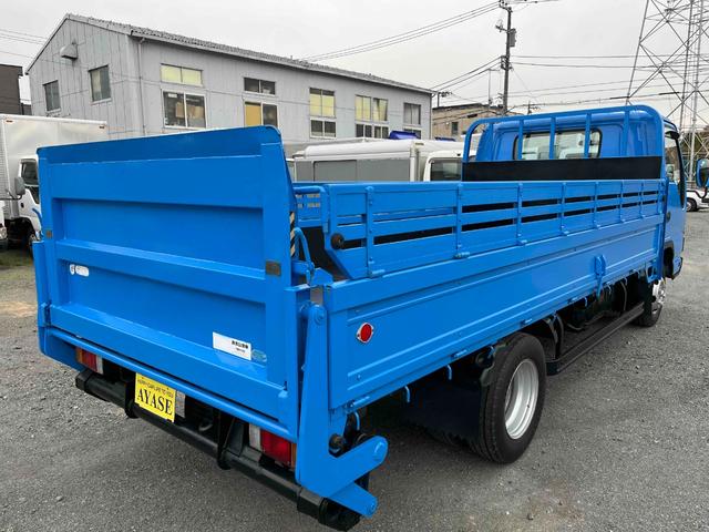 エルフトラック パワーゲート付ワイドロング3t積み平ボディー スムーサーAT ワイドロング3t積み平床ボディー スムーサーAT 車検R8年9月25日 荷台内寸長435幅200高68cm 荷台床面鉄板敷き 左右アオリ上下分割式 楽々ゲート付 新明和製アーム式PG付 タイヤ山7分(23枚目)