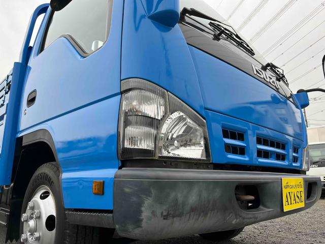 エルフトラック パワーゲート付ワイドロング3t積み平ボディー スムーサーAT ワイドロング3t積み平床ボディー スムーサーAT 車検R8年9月25日 荷台内寸長435幅200高68cm 荷台床面鉄板敷き 左右アオリ上下分割式 楽々ゲート付 新明和製アーム式PG付 タイヤ山7分(26枚目)