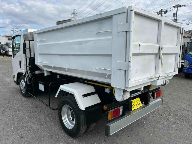 アトラストラック コンテナ付3t積アームロール新明和Wシリンダー 6速MT 3t積み脱着装置付コンテナ専用車 6速MT 新明和製アームロール 型式CCA23-12 ツインホイスト キャブバックデッキ付 観音開き仕様コンテナ付 タイヤ山6分 車両総重量6115キロ(4枚目)