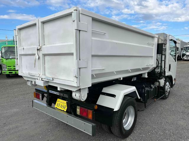 アトラストラック コンテナ付3t積アームロール新明和Wシリンダー 6速MT 3t積み脱着装置付コンテナ専用車 6速MT 新明和製アームロール 型式CCA23-12 ツインホイスト キャブバックデッキ付 観音開き仕様コンテナ付 タイヤ山6分 車両総重量6115キロ(22枚目)