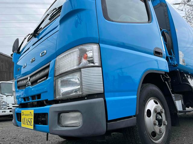 キャンター ダンボール回収歴車　２．３５ｔ積プレス式パッカー車４．９立米　ダンボール回収歴車　２．３５ｔ積プレス式パッカー車　５速ＭＴ　バックカメラ付　モリタエコノス製４．９立米　荷箱型式ＰＡ５５Ｈ　連続スイッチ　汚水タンク付　車両総重量６６８５キロ（25枚目）