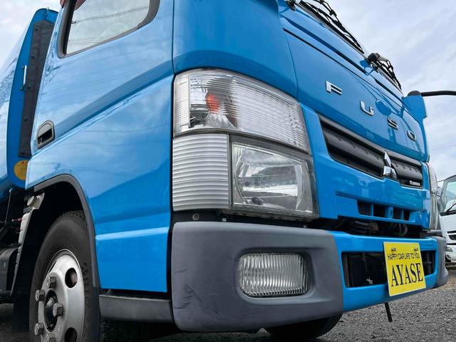 キャンター ダンボール回収歴車　２．３５ｔ積プレス式パッカー車４．９立米　ダンボール回収歴車　２．３５ｔ積プレス式パッカー車　５速ＭＴ　バックカメラ付　モリタエコノス製４．９立米　荷箱型式ＰＡ５５Ｈ　連続スイッチ　汚水タンク付　車両総重量６６８５キロ（26枚目）