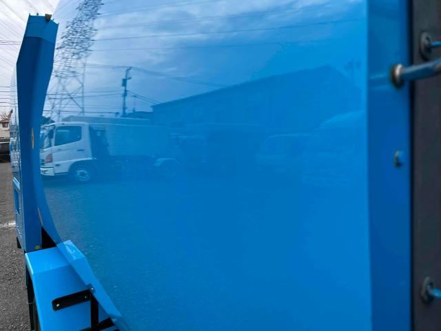 キャンター ダンボール回収歴車　２．３５ｔ積プレス式パッカー車４．９立米　ダンボール回収歴車　２．３５ｔ積プレス式パッカー車　５速ＭＴ　バックカメラ付　モリタエコノス製４．９立米　荷箱型式ＰＡ５５Ｈ　連続スイッチ　汚水タンク付　車両総重量６６８５キロ（28枚目）