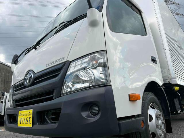 トヨエース 跳ね上げゲート蓋ワイド超々ロング２．８５ｔ積アルミバンＡＴ　ワイド超々ロングアルミバン　ＡＴ車　社外ナビ　ＥＴＣ　バックカメラ　荷台内寸長５６５幅２０８高１９８ｃｍ　荷台床面鉄板敷き　ラッシングレール２段　極東製跳ね上げパワーゲート付　タイヤ山７分（25枚目）