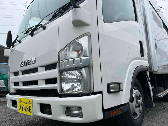 エルフトラック ２ｔ積セミロング５室仕様ボトルカー　ＡＴ　上下仕切り付　セミロング２ｔ積ボトルカー　スムーサーＡＴ　５室仕様　上下仕切り板付　リヤ跳上扉　金庫付　荷室カギ付　ＥＴＣ　カラーバックカメラ付　車両総重量４９８０キロ　５ｔ限定免許対応（24枚目）