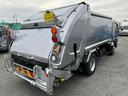 ２．６ｔ積プレス式パッカー車　新明和７．４立米　２．６ｔ積プレス式パッカー車　５速ＭＴ　ＥＴＣ　バックカメラ付　新明和製Ｇ－ＰＸ　タンク床面ステンレス　容積７．４立米　連続スイッチ　ステンレス汚水タンク　コンテナ反転装置付　車両総重量７９８５ｋｇ（24枚目）