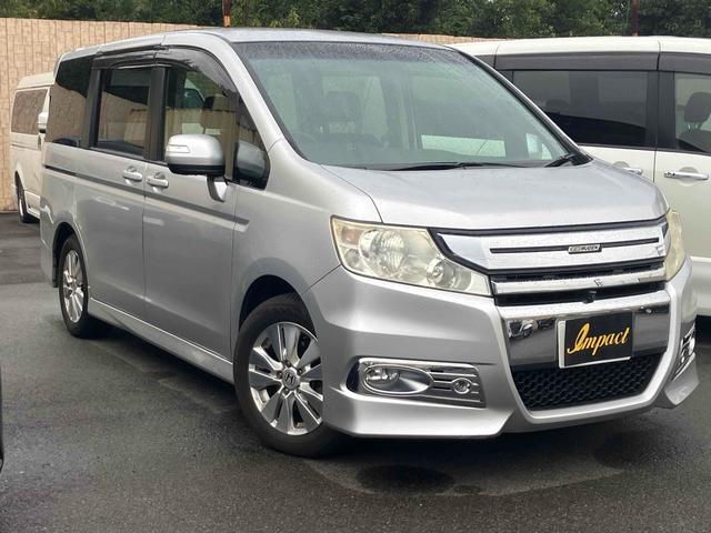 ステップワゴンスパーダ Ｚ　無限グリル　地デジナビテレビ　タイミングチェーン　カメラ　ＥＴＣ　全周囲カメラ　ナビ　ＴＶ　両側電動スライドドア　ＨＩＤ　スマートキー　アイドリングストップ　電動格納ミラー　後席モニター　ＣＶＴ　アルミホイール　ＣＤ　盗難防止システム　衝突安全ボディ　ＡＢＳ（13枚目）