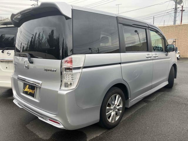 ステップワゴンスパーダ Ｚ　無限グリル　地デジナビテレビ　タイミングチェーン　カメラ　ＥＴＣ　全周囲カメラ　ナビ　ＴＶ　両側電動スライドドア　ＨＩＤ　スマートキー　アイドリングストップ　電動格納ミラー　後席モニター　ＣＶＴ　アルミホイール　ＣＤ　盗難防止システム　衝突安全ボディ　ＡＢＳ（15枚目）