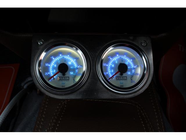 ハイラックススポーツピック エクストラキャブ　ジャッツエアサス装着　Ｃノッチ加工　デイトナクロームホイール　ホワイトリボンタイヤ　トノカバー　社外ウッドステアリング　シートカバー　社外ナビ　ＥＴＣ（18枚目）