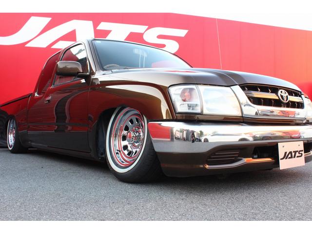 ハイラックススポーツピック エクストラキャブ　ジャッツエアサス装着　Ｃノッチ加工　デイトナクロームホイール　ホワイトリボンタイヤ　トノカバー　社外ウッドステアリング　シートカバー　社外ナビ　ＥＴＣ（26枚目）