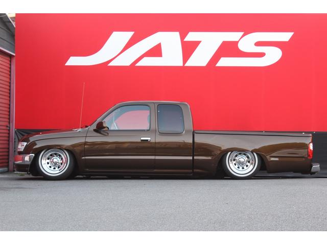 ハイラックススポーツピック エクストラキャブ　ジャッツエアサス装着　Ｃノッチ加工　デイトナクロームホイール　ホワイトリボンタイヤ　トノカバー　社外ウッドステアリング　シートカバー　社外ナビ　ＥＴＣ（33枚目）