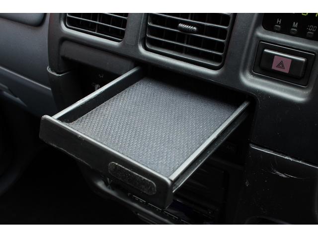 ハイラックススポーツピック エクストラキャブ　ローダウンブロック　デイトナブラックホイール　リアステップバンパー　社外グリル　社外オーディオ　ＥＴＣ　４速ＡＴ　積載量２５０キロ（16枚目）