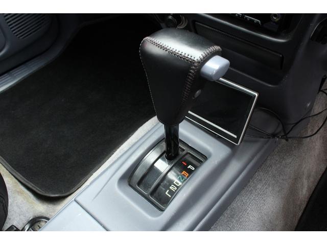 ハイラックススポーツピック エクストラキャブ　ローダウンブロック　デイトナブラックホイール　リアステップバンパー　社外グリル　社外オーディオ　ＥＴＣ　４速ＡＴ　積載量２５０キロ（20枚目）