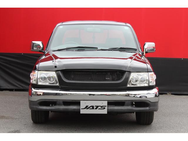 ハイラックススポーツピック エクストラキャブ　ローダウンブロック　デイトナブラックホイール　リアステップバンパー　社外グリル　社外オーディオ　ＥＴＣ　４速ＡＴ　積載量２５０キロ（24枚目）