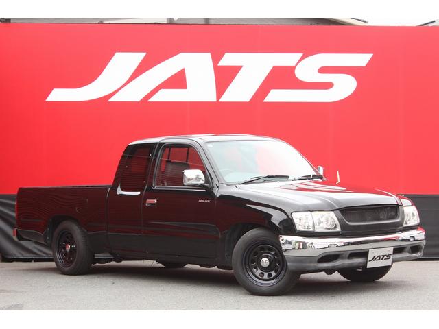 ハイラックススポーツピック エクストラキャブ　ローダウンブロック　デイトナブラックホイール　リアステップバンパー　社外グリル　社外オーディオ　ＥＴＣ　４速ＡＴ　積載量２５０キロ（25枚目）