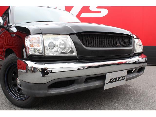 ハイラックススポーツピック エクストラキャブ　ローダウンブロック　デイトナブラックホイール　リアステップバンパー　社外グリル　社外オーディオ　ＥＴＣ　４速ＡＴ　積載量２５０キロ（26枚目）