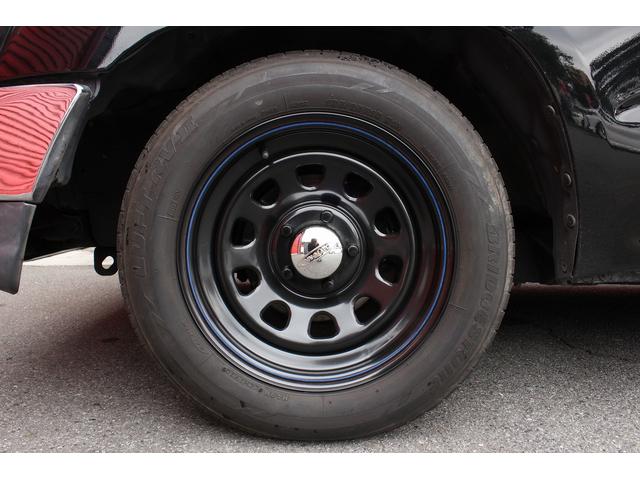 ハイラックススポーツピック エクストラキャブ　ローダウンブロック　デイトナブラックホイール　リアステップバンパー　社外グリル　社外オーディオ　ＥＴＣ　４速ＡＴ　積載量２５０キロ（29枚目）