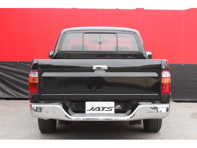 ハイラックススポーツピック エクストラキャブ　ローダウンブロック　デイトナブラックホイール　リアステップバンパー　社外グリル　社外オーディオ　ＥＴＣ　４速ＡＴ　積載量２５０キロ（33枚目）