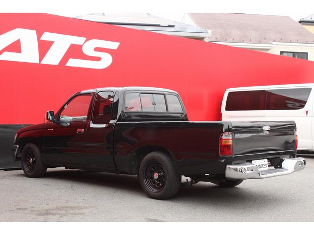 ハイラックススポーツピック エクストラキャブ　ローダウンブロック　デイトナブラックホイール　リアステップバンパー　社外グリル　社外オーディオ　ＥＴＣ　４速ＡＴ　積載量２５０キロ（34枚目）