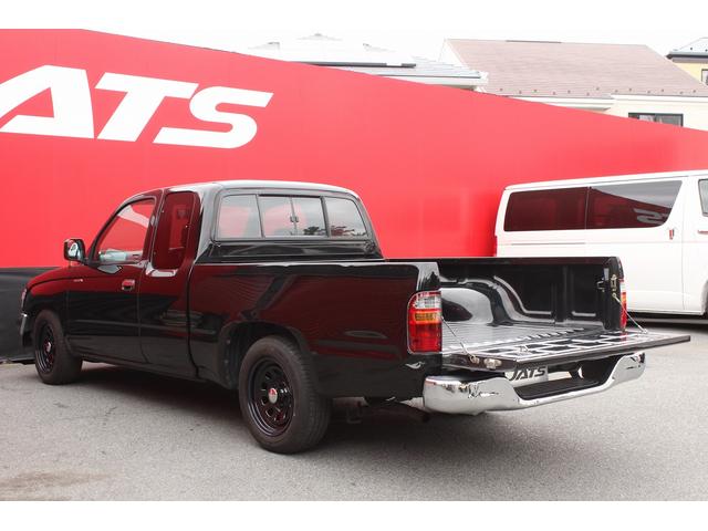 ハイラックススポーツピック エクストラキャブ　ローダウンブロック　デイトナブラックホイール　リアステップバンパー　社外グリル　社外オーディオ　ＥＴＣ　４速ＡＴ　積載量２５０キロ（38枚目）