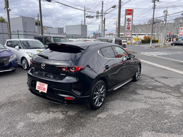 MAZDA3ファストバック 20Sバーガンディ セレクション オプション(360度セーフティPK・BOSEサウンドシステム+12スピーカー・フロント&リア&サイド&アンダースカートスポイラー・イルミスカッフプレート・ビルトインETC)シート&ステアリングヒーター(3枚目)