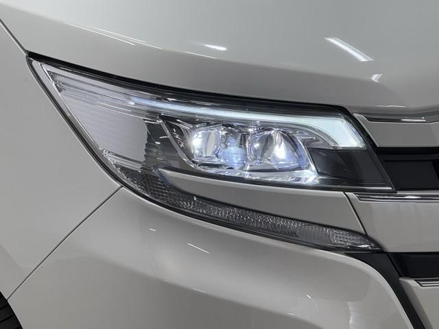 ノア ハイブリッドＧ　Ｒカメラ　スマートキー＆プッシュスタート　ＬＥＤへッドライト　地デジ　イモビライザー　記録簿有　Ｗエアコン　パワーウインドウ　アルミ　クルコン　エアバッグ　横滑り防止　ＤＶＤ再生機能　フルフラット（19枚目）