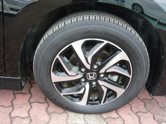 ステップワゴンスパーダ スパーダ　衝突被害軽減ブレーキ　横滑り防止装置　クルーズコントロール　両側電動スライドドア　オートライト　フリップダウンモニター　ナビ　フルセグＴＶ　ブルートゥース　ＨＤＭＩ　ＥＴＣ　純正アルミホイール（27枚目）