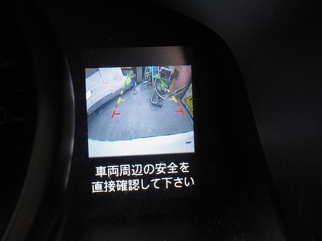 ＮＶ２００バネットバン 　福祉車両・手動スロープ・車いす１名・計７人乗・リヤクーラー・左側ドア連動オートステップ・アシストグリップ・社外ナビ　純正バックカメラ・キーレス・車イス後退防止ベルトサード・電動車イス固定装置サード（5枚目）