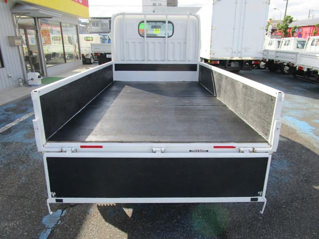 アトラストラック ショートフルスーパーローＤＸ　１．５ｔショートボディー　フルスーパーロー　Ｒシングルタイヤ木製荷台　Ｗ　ＳＲＳエアバック　ＡＢＳ　キーレス　セキュリティー　左電動格納ミラー　社外ＥＴＣ（9枚目）