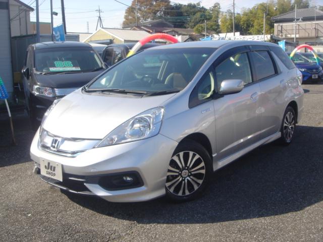 フィットシャトルハイブリッド ハイブリッド・スマートセレクション SDナビ・ワンセグ・Rカメラ・シートヒーター・クルコン・HID・ETC・パドルシフト・AUTOヘッドライト・革巻きステアリング・Bluetooth・純正AW・スマートキー・ステアリングスイッチ・禁煙車(5枚目)