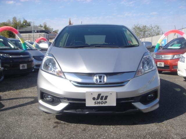 フィットシャトルハイブリッド ハイブリッド・スマートセレクション SDナビ・ワンセグ・Rカメラ・シートヒーター・クルコン・HID・ETC・パドルシフト・AUTOヘッドライト・革巻きステアリング・Bluetooth・純正AW・スマートキー・ステアリングスイッチ・禁煙車(7枚目)