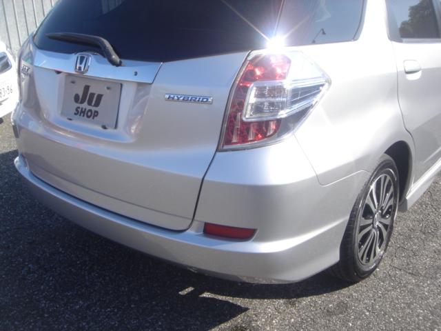 フィットシャトルハイブリッド ハイブリッド・スマートセレクション SDナビ・ワンセグ・Rカメラ・シートヒーター・クルコン・HID・ETC・パドルシフト・AUTOヘッドライト・革巻きステアリング・Bluetooth・純正AW・スマートキー・ステアリングスイッチ・禁煙車(35枚目)