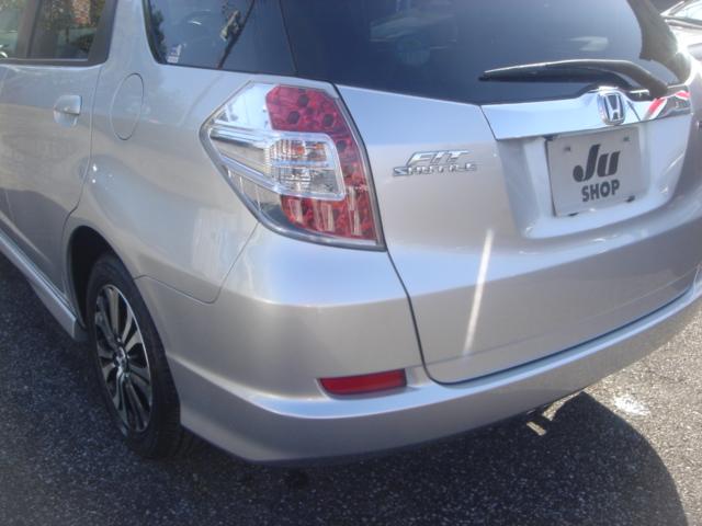 フィットシャトルハイブリッド ハイブリッド・スマートセレクション SDナビ・ワンセグ・Rカメラ・シートヒーター・クルコン・HID・ETC・パドルシフト・AUTOヘッドライト・革巻きステアリング・Bluetooth・純正AW・スマートキー・ステアリングスイッチ・禁煙車(36枚目)