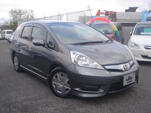 フィットシャトルハイブリッド ハイブリッド・スマートセレクション HDDナビ・1セグ・Rカメラ・HID・ETC・クルコン・VIDEO入力端子・USB入力端子・ステアリングスイッチ・AUTOヘッドライト・スマートキー・ECOモードスイッチ・横滑り防止装置・禁煙車(2枚目)