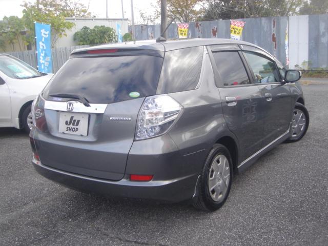 フィットシャトルハイブリッド ハイブリッド・スマートセレクション HDDナビ・1セグ・Rカメラ・HID・ETC・クルコン・VIDEO入力端子・USB入力端子・ステアリングスイッチ・AUTOヘッドライト・スマートキー・ECOモードスイッチ・横滑り防止装置・禁煙車(6枚目)