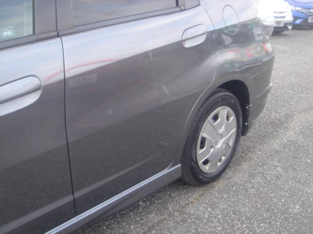 フィットシャトルハイブリッド ハイブリッド・スマートセレクション HDDナビ・1セグ・Rカメラ・HID・ETC・クルコン・VIDEO入力端子・USB入力端子・ステアリングスイッチ・AUTOヘッドライト・スマートキー・ECOモードスイッチ・横滑り防止装置・禁煙車(38枚目)