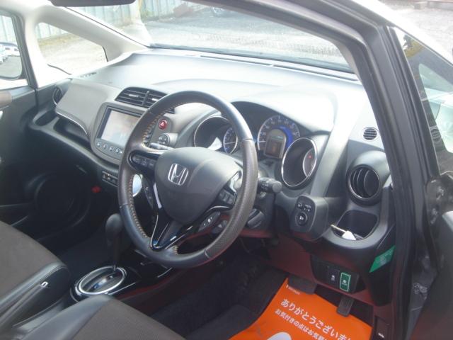 フィットシャトルハイブリッド ハイブリッド・スマートセレクション HDDナビ・1セグ・Rカメラ・HID・ETC・クルコン・VIDEO入力端子・USB入力端子・ステアリングスイッチ・AUTOヘッドライト・スマートキー・ECOモードスイッチ・横滑り防止装置・禁煙車(51枚目)