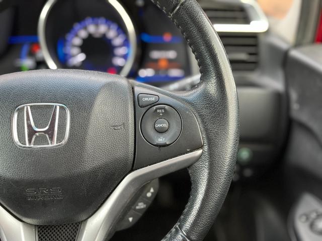 フィットハイブリッド Ｆパッケージ　ワンオーナー　クルコン　ナビ　フルセグＴＶ　ＤＶＤ再生　Ｂｌｕｅｔｏｏｔｈオーディオ　ミュージックラック　ステリモ　バックカメラ　ＥＴＣ　ドラレコ　スマートキープッシュスタート　ＬＥＤオートライト（10枚目）