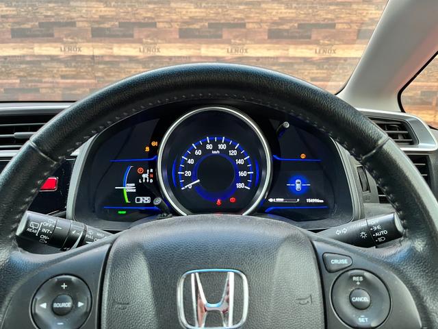 フィットハイブリッド Ｆパッケージ　ワンオーナー　クルコン　ナビ　フルセグＴＶ　ＤＶＤ再生　Ｂｌｕｅｔｏｏｔｈオーディオ　ミュージックラック　ステリモ　バックカメラ　ＥＴＣ　ドラレコ　スマートキープッシュスタート　ＬＥＤオートライト（14枚目）