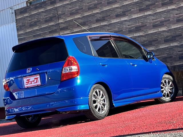 フィット 1.5T エアロ TEIN車高調足廻り CUSCOタワーバー パドルシフト ETC2.0 フォグランプ 社外14インチアルミホイール バニティミラー チルトステアリング シートリフター 無限ドアバイザー(7枚目)