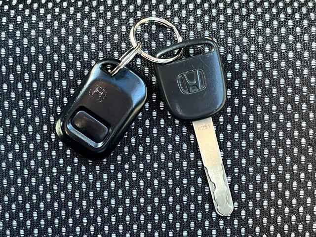 フィット 1.5T エアロ TEIN車高調足廻り CUSCOタワーバー パドルシフト ETC2.0 フォグランプ 社外14インチアルミホイール バニティミラー チルトステアリング シートリフター 無限ドアバイザー(19枚目)