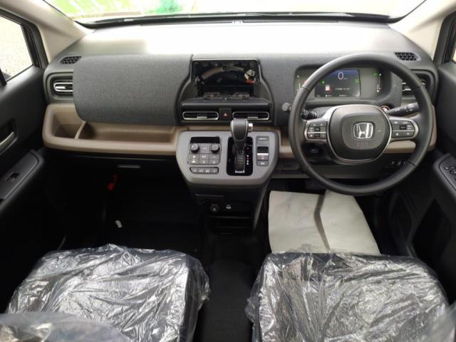 フリード ｅ：ＨＥＶエアー　ＥＸ　登録済未使用車　ＬＥＤライト両Ａドア衝突軽減ＢシートＨキーフ（3枚目）