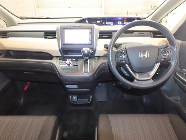 フリード G・ホンダセンシング 7人乗り メモリーナビ 両側パワースライドドア フルセグ/DVD バックカメラ ETC スマートキー 衝突被害軽減システム 横滑り防止 車線逸脱警報 レーダークルーズ 記録簿(3枚目)