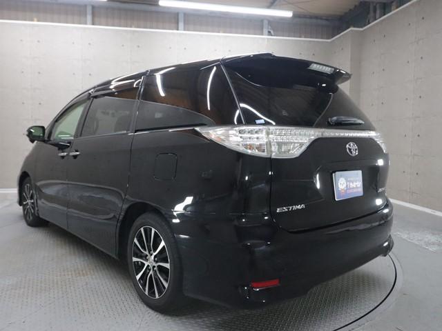 エスティマ アエラス 7人乗り 8インチHDDナビ 後席フリップダウンモニター 両側パワースライドドア フルセグ 前後ドライブレコーダー バックカメラ ETC HIDヘッドライト スマートキー 後席オットマンシート 記録簿(3枚目)