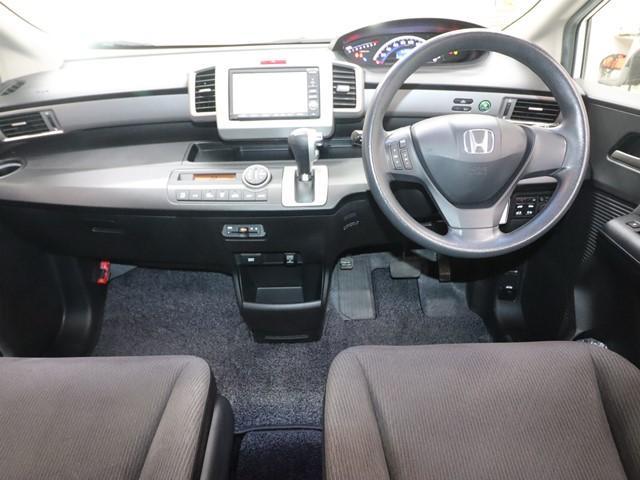 フリード フレックスi エアロ 5人乗り HDDナビ 両側電動スライドドア ワンセグ/DVD対応 バックカメラ ETC車載器 HIDヘッドライト スマートキー オートエアコン 純正アルミホイール 記録簿(4枚目)