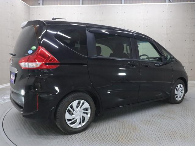 フリード Ｇ・ホンダセンシング　６人乗り　９インチメモリーナビ　両側電動スライド　フルセグ／ＤＶＤ／Ｂｌｕｅｔｏｏｔｈ対応　バックカメラ　レーンアシスト　ＥＴＣ　スマートキー　記録簿（2枚目）