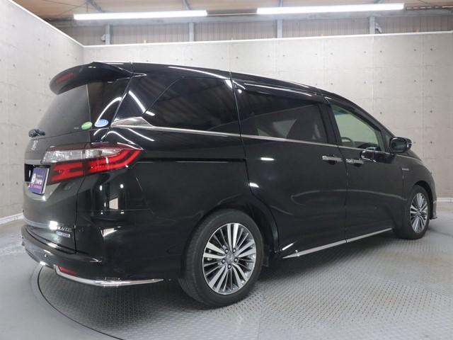 オデッセイハイブリッド ハイブリッドアブソルート・EXホンダセンシング 7人乗り メモリーナビ 両側電動スライド 衝突被害軽減システム フルセグ/Bluetooth 全方位カメラ LEDライト 電動シート シートヒーター 後席モニター 車線逸脱警報 コーナーセンサー(2枚目)